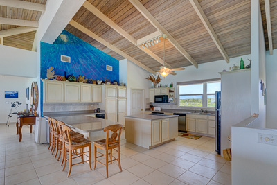 View to the kitchen at The Family Beach House on San Salvador