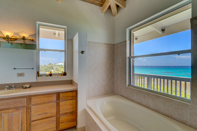 The Master bedroom at The Family Beach House on San Salvador